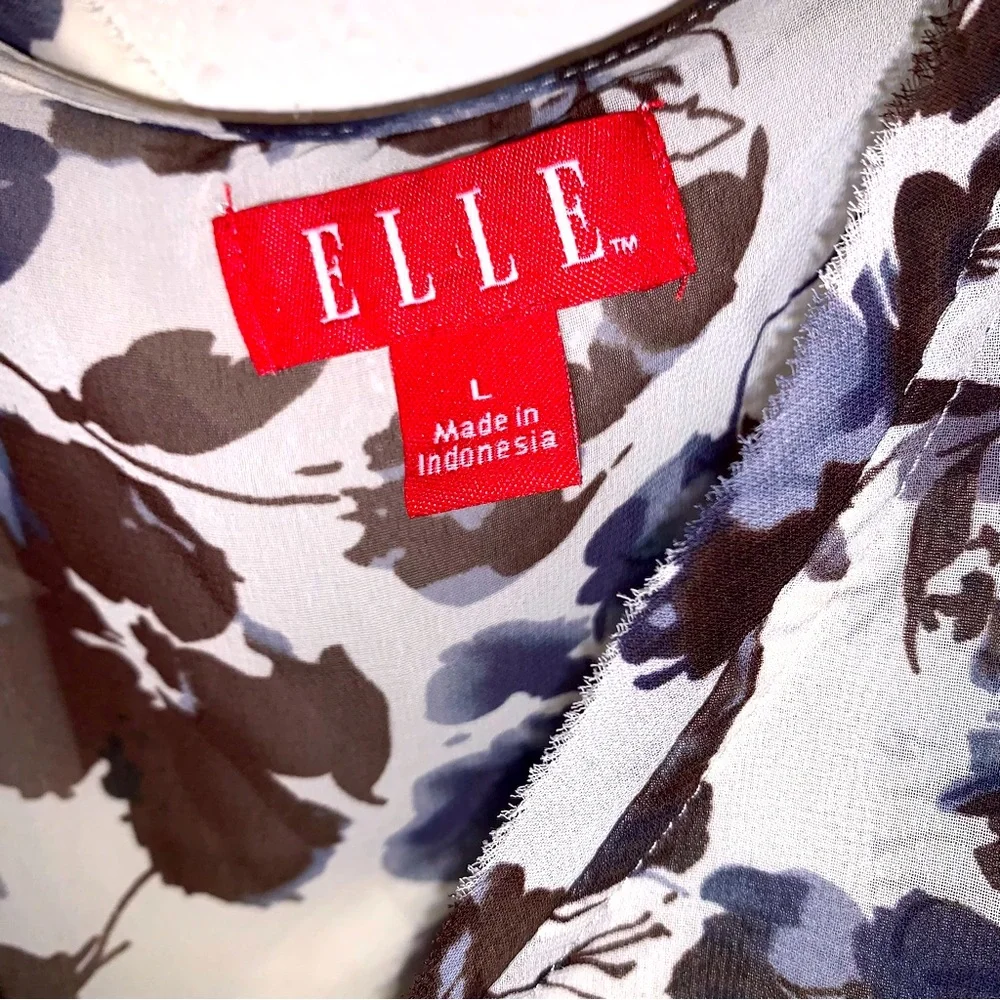 Elle this preowned